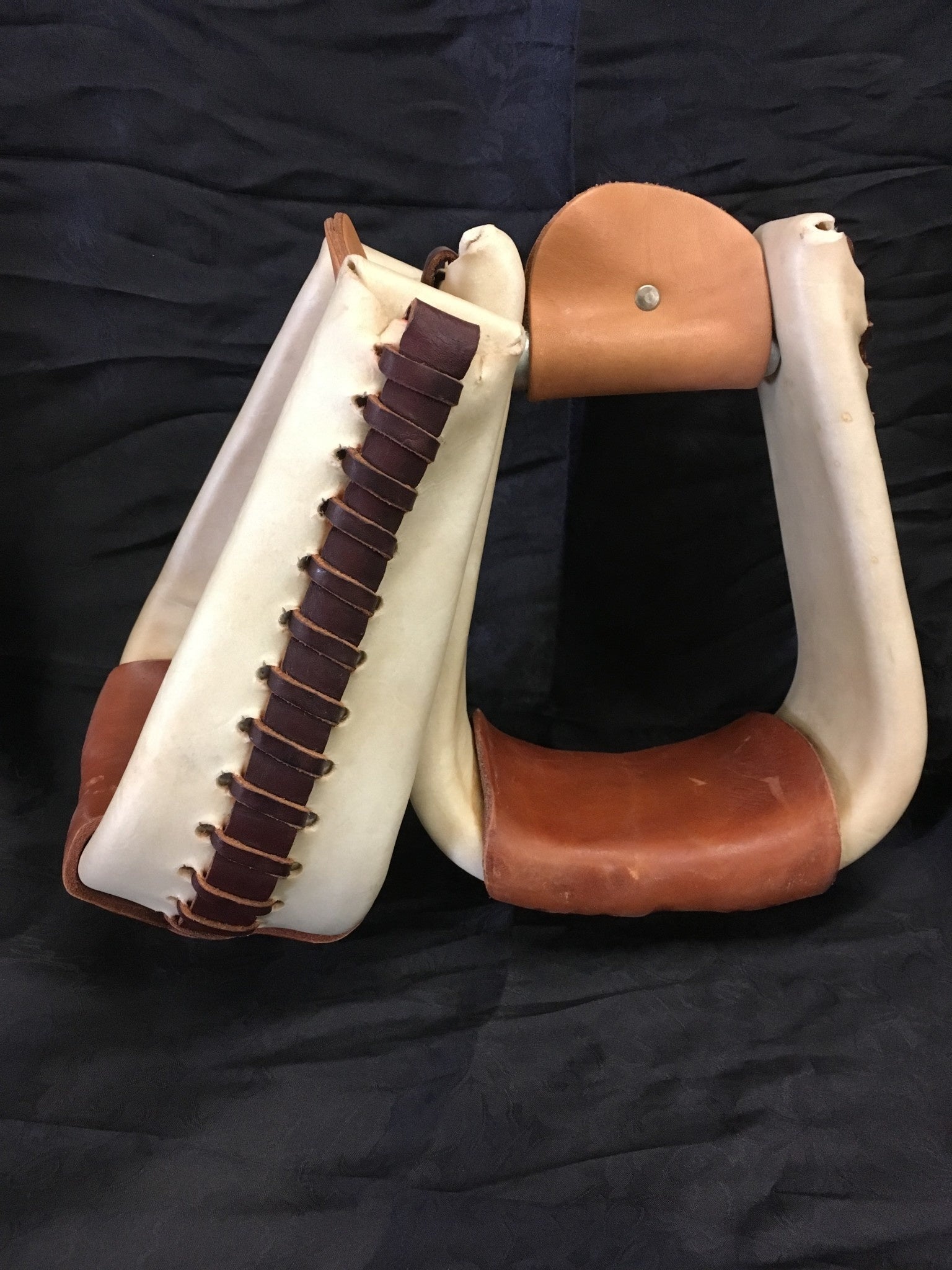 Deep Roper Bleached Rawhide Stirrups.