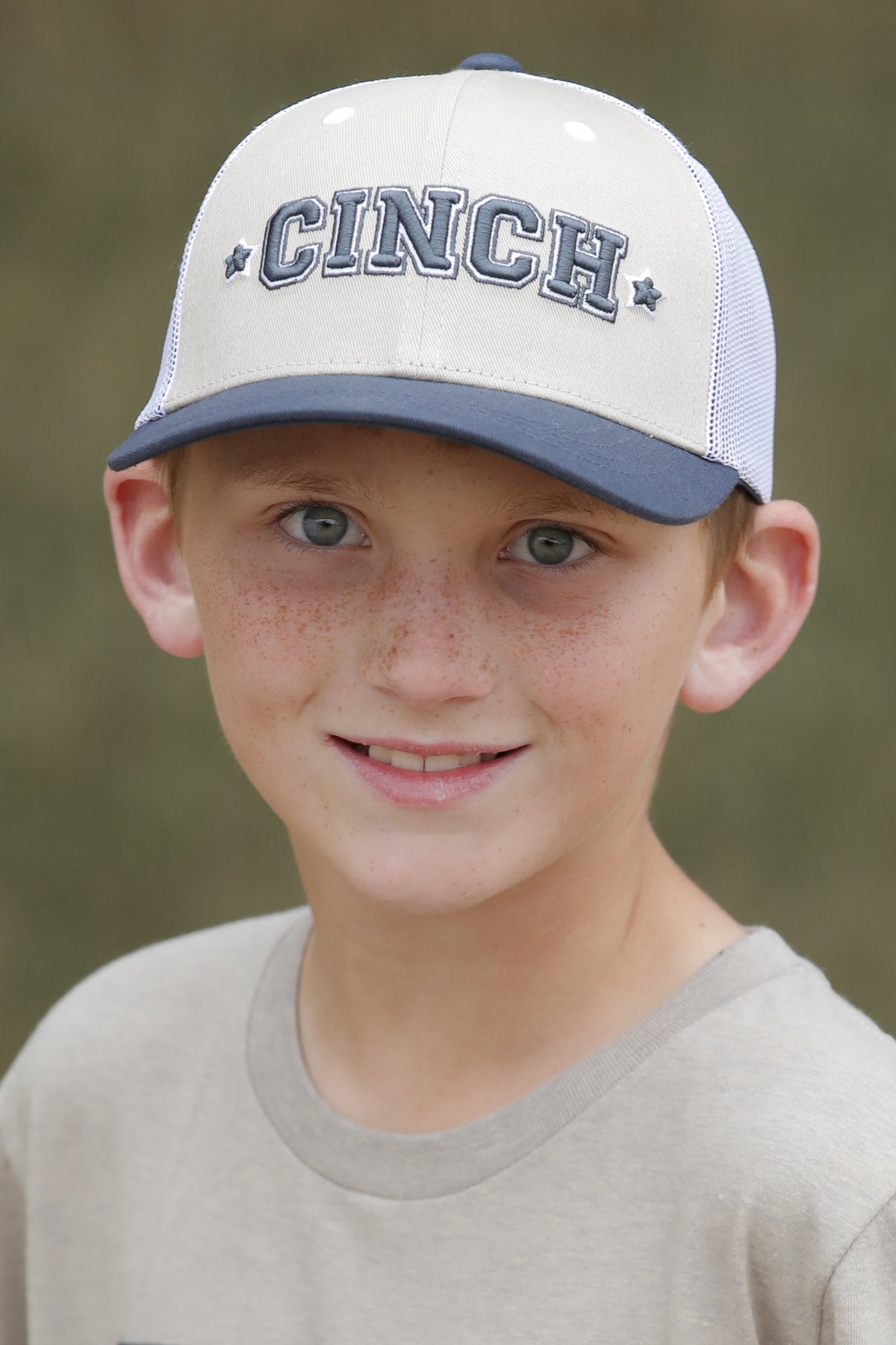 Cinch Boy's Khaki FLEXFIT Trucker Cap.