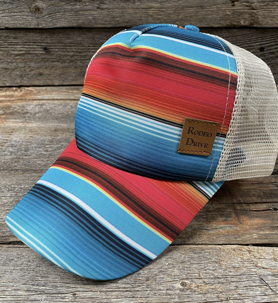 Rodeo Drive Serape Ponytail Trucker Hat.